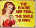 Vintage Design Blechschild - THE BOOBS ARE REAL THE SMILE IS